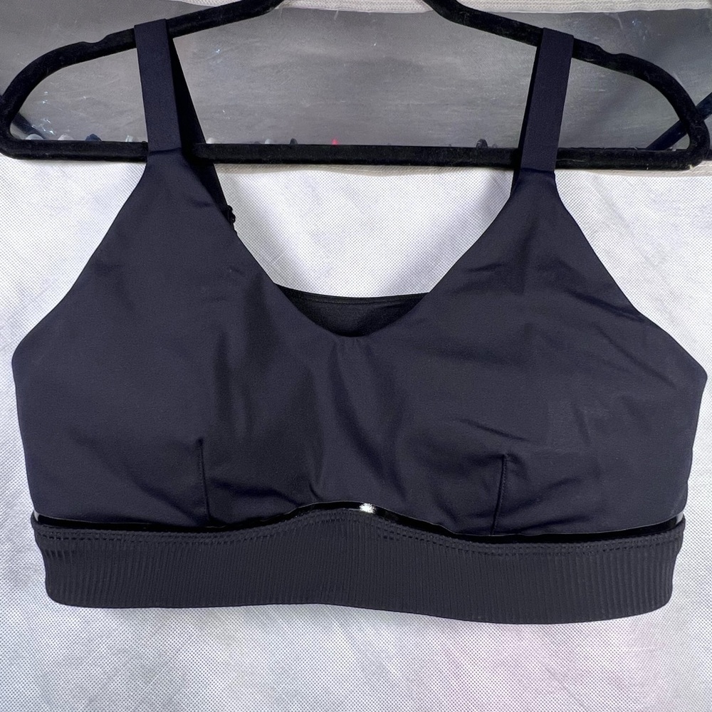 LULULEMON Excellent Condition Removable Padding with reflective decor size 10